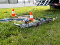 Robot met grijper verwijdert obstakels uit riolering